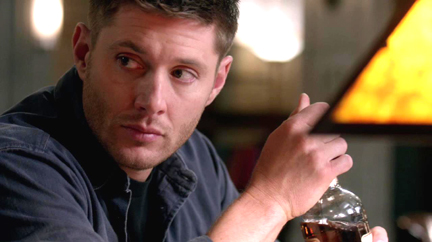 Dean makes sure Sam's gone before taking out the bottle.